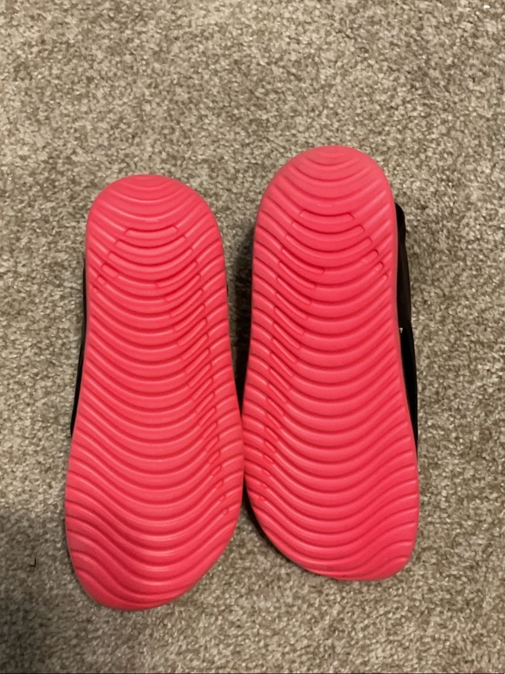 Nike Kids Black Slides with Bright Pink Accents
